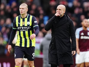 Manchester City manager Pep Guardiola (right) and Erling Haaland after the Premier League match at Villa Park