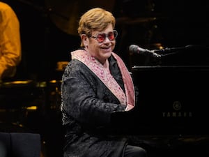 Elton John at the piano during his Farewell Yellow Brick Road show in Stockholm