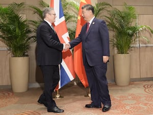 Sir Keir Starmer shakes hands with President Xi Jinping