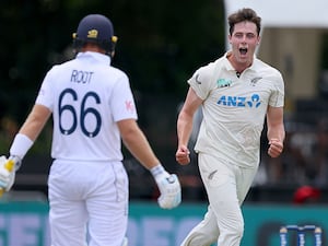 Will O’Rourke celebrates the wicket of Joe Root