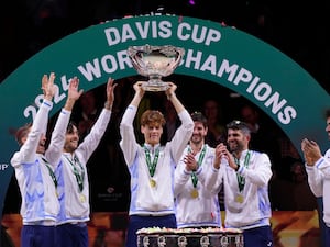 Jannik Sinner holds the Davis Cup trophy