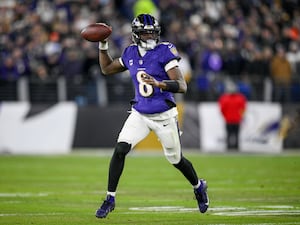 Baltimore Ravens quarterback Lamar Jackson looks to pass against the Pittsburgh Steelers