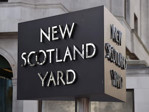 The New Scotland Yard sign