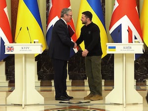 Prime Minister Sir Keir Starmer and Ukrainian President Volodymyr Zelensky shake hands