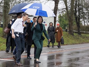 Chancellor of the Exchequer Rachel Reeves carrying an umbrella