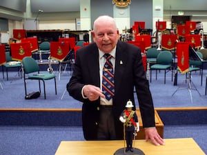 Former Royal Marines Musician George Latham with his treasured statue (Ministry of Defence/Crown Copyright/PA)