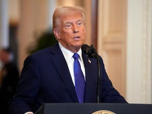 President Donald Trump speaking in the East Room of the White House in Washington