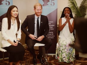 The Duke of Sussex with Legacy Award recipients Chiara Riyanti Hutapea Zhang and Christina Williams