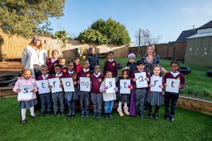 Celebrating the Ofsted success are early years pupils with Early Years lead Sue Murphy (left) and principal Jenny Byrne (right). Photo: Wolverhampton Council