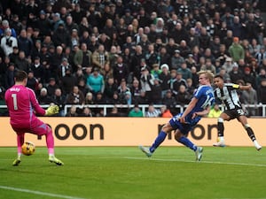 Newcastle’s Jacob Murphy (right) scores the final goal in a 4-0 victory over Leicester