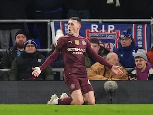 Manchester City’s Phil Foden celebrates his opening goal against Ipswich