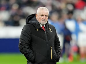 Wales head coach Warren Gatland walks in the pitch ahead of his side's game in France