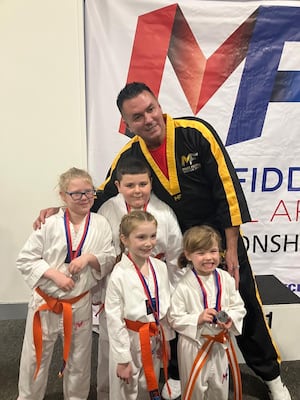 Master Fiddes with some of the students at the Championships 