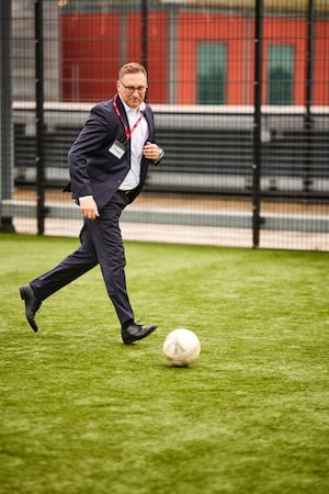 Regional Managing Director, David Hesson, playing football at Warrington Youth Zone