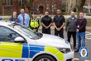 Inspector Saqib Butt (centre) and officers from his problem solving team