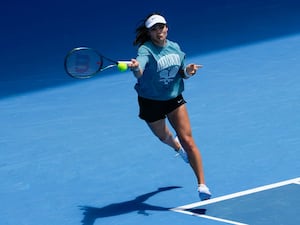 Emma Raducanu plays a forehand during a practice session