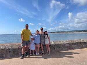 Hallie-Mae (second left) pictured with her family.