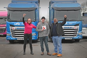 Alex Jeavons (middle) with the HGV School iN Willenahll general manager Kate Sanders (L) and Driver trainer Sukhjit SIngh (R).