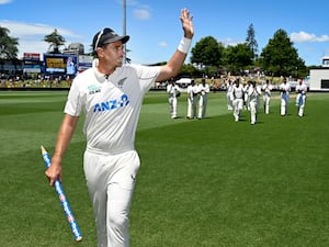 New Zealand’s Tim Southee waves as he leads his team from the field