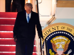 President Donald Trump arrives on Air Force One at Joint Base Andrews after returning from Florida