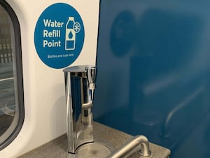 A water refill point on an Avanti West Coast train