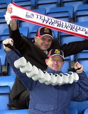 Telford United F.C. Commercial Manager Robin Eaves with the maker of the club's new mugs Stephen Dean from James Dean Pottery, Bridgnorth.