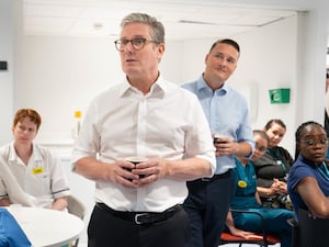 Sir Keir Starmer, centre and Wes Streeting during a visit to a hospital