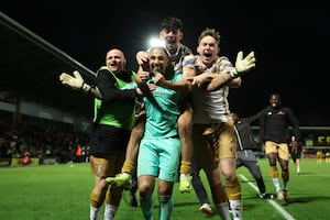 Tamworth celebrate in the wake of their stunning FA Cup penalty success over Burton to reach the third round. Pic: Getty