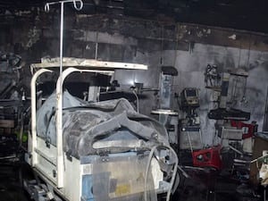 Equipment damaged by fire lies inside a neonatal intensive care unit at Jhansi Medical College hospital in Jhansi