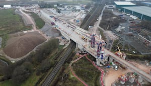 The viaduct sits over the current railway line, and adjacent to the River Tame