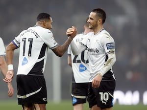 Jerry Yates, right, celebrates his goal with Nathaniel Mendez-Laing