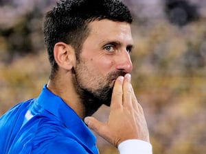 Novak Djokovic blows a kiss after beating Jaime Faria