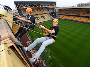 John Richards abseiling at Molineux 