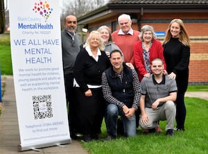 Black Country Mental Health volunteers celebrate receiving The Kings Award for Voluntary Service.