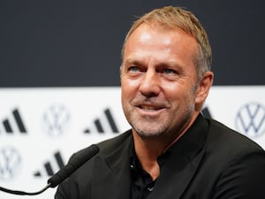 Hansi Flick smiles at a Germany press conference