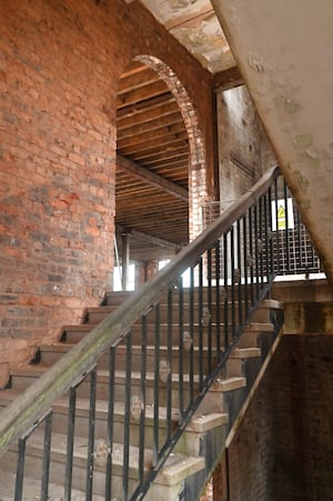 The staircase leading down to the entrance off Skinner Street