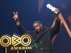 Bashy celebrates winning best album for Being Poor Is Expensive during the Mobo Awards in Newcastle