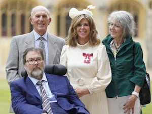 Kate Garraway with her husband Derek Draper and her parents after being honoured for her services to broadcasting, journalism and charity