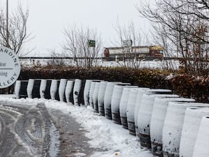 Snow covered barrels at Tullibardine Distillery, Blackford, Perthshire