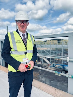 Councillor Jonathan Price, cabinet member for education and SEND, at the construction site of the Rugeley John Taylor School, Staffordshire’s first all-through school. Photo courtesy of Staffordshire County Council