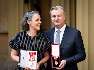 Emma Thomas and Christopher Nolan with their honours