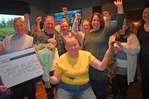 Tracy after the head shave with friends and supporters