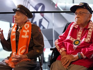 Two US veterans sitting side by side