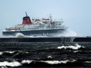 A Caledonian MacBrayne ferry sails in choppy seas