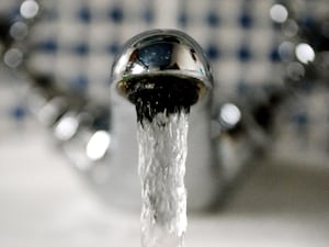 Water running from a household tap