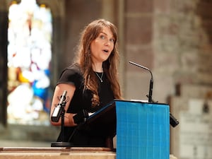 Christina Hendry speaking in a church