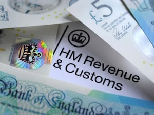 Bank notes and a letter from HMRC