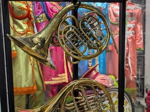 Two of the four French horns used on Sgt. Pepper's