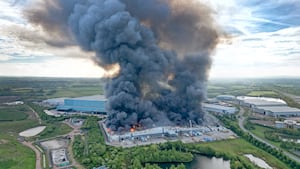 The Super Smart Service building pictured when the fire broke out in May