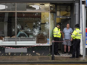 Police outside a damaged butchers shop in Hartlepool